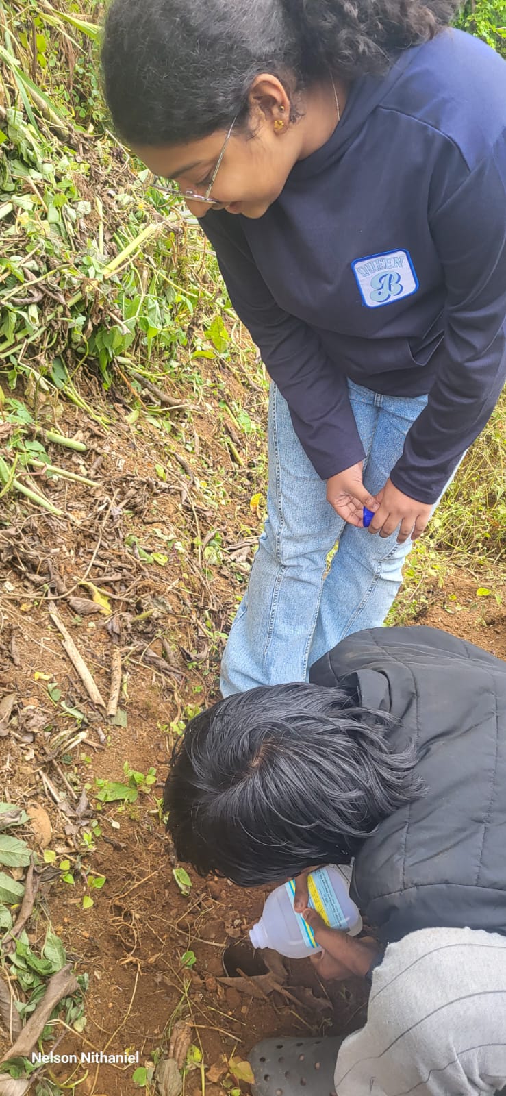 Digging for Discoveries: Grade 10 Sets Up a Pooter in the Garden Patch at bms