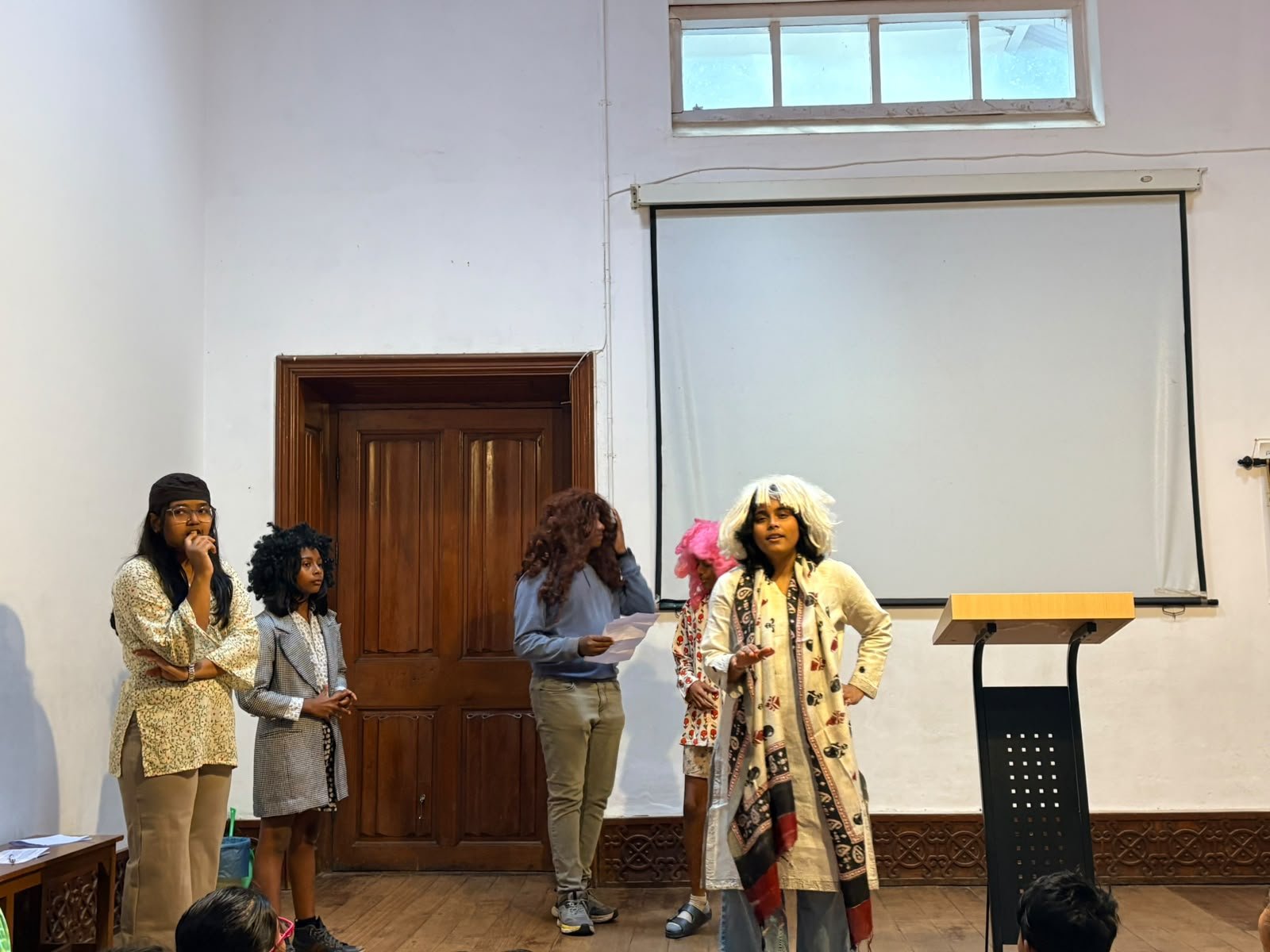 Grade 8 students performing at their class assembly