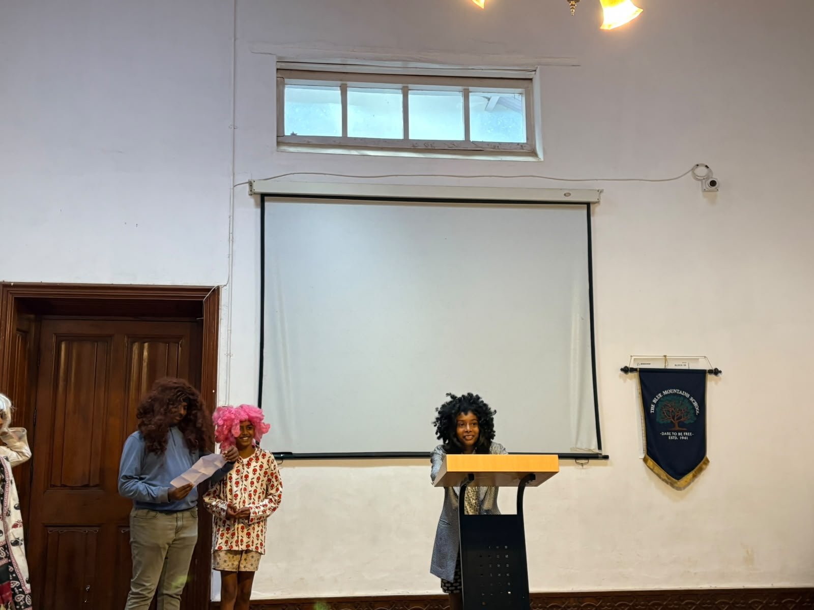 Grade 8 students performing at their class assembly
