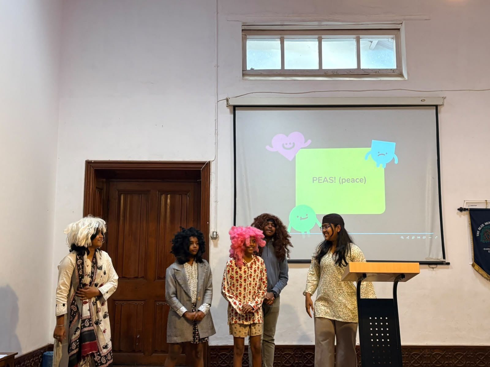 Grade 8 students performing at their class assembly