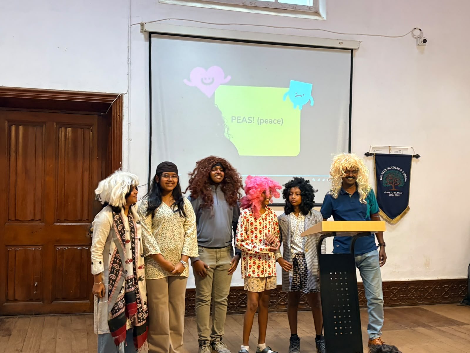 Grade 8 students performing at their class assembly