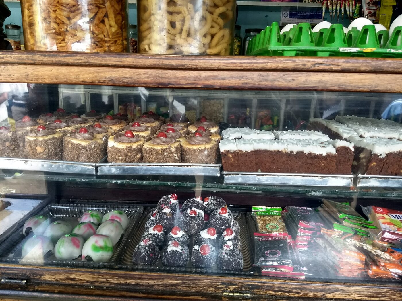 More cakes and coconut balls on display