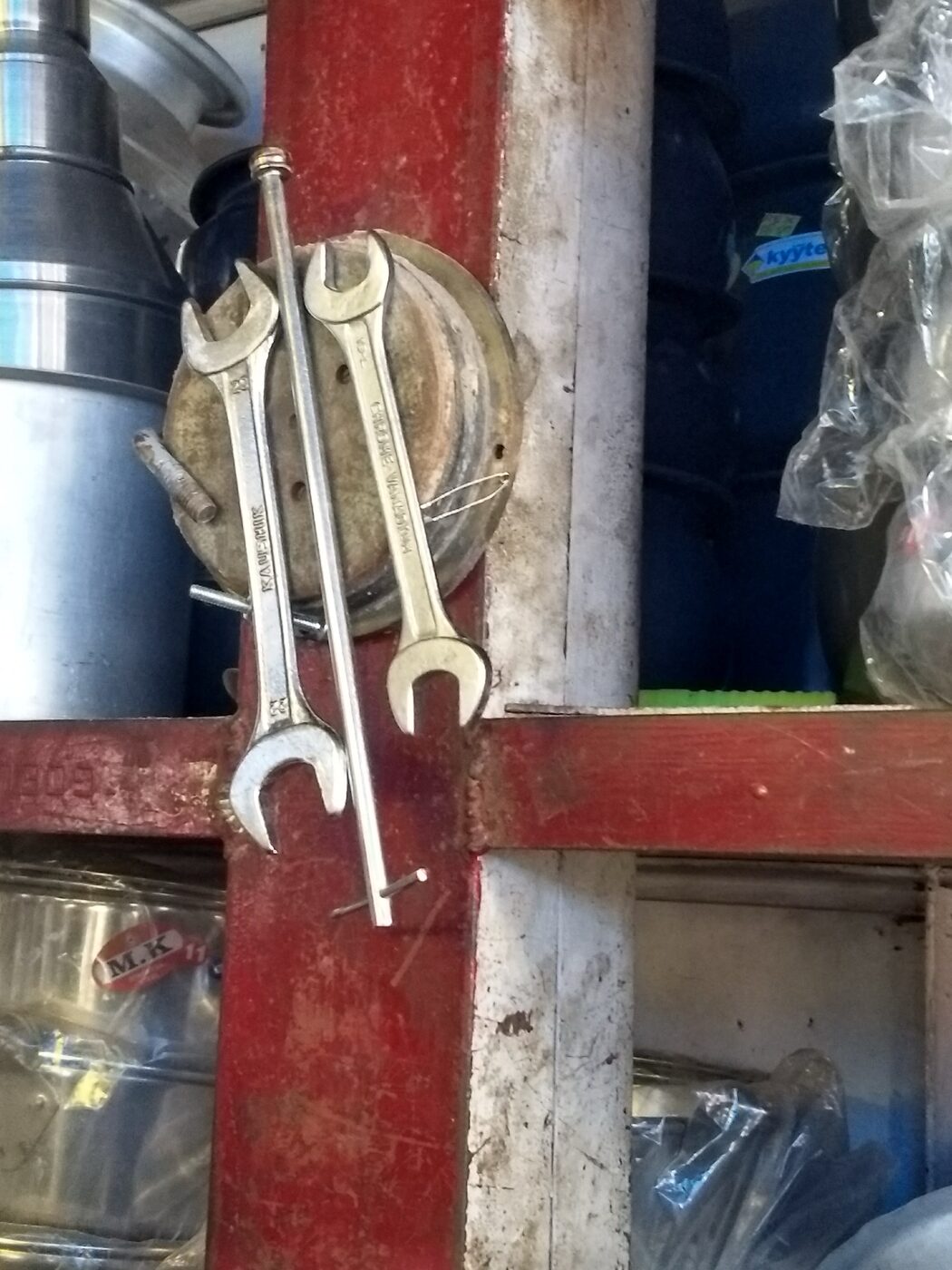 Wrenches hanging by a magnet